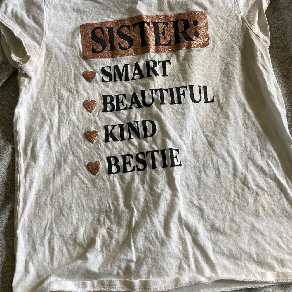 white "sister " tee , children place